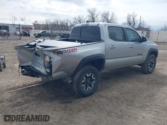 2023 Toyota Tacoma 4WD SR with VIN 3TMCZ5AN0PM609672, listed as a IAAI auction lot 41830191 with 24,244 mi miles. Bid and sale history available at carsss.com. Image 4.