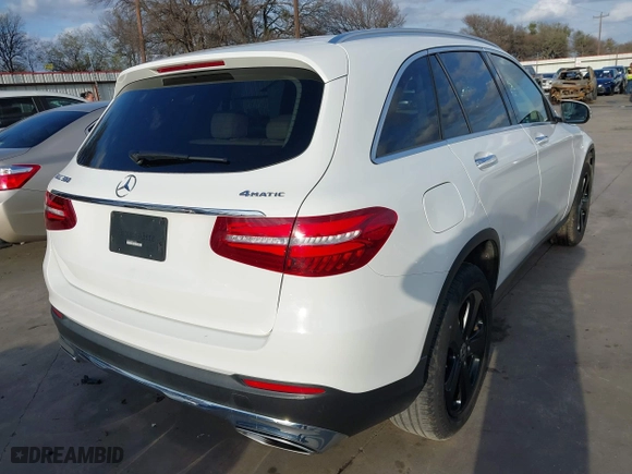 2019 Mercedes-Benz GLC with VIN WDC0G4KB0KV154015, listed as a IAAI auction lot 41049218 with 38,473 mi miles. Bid and sale history available at carsss.com. Image 4.