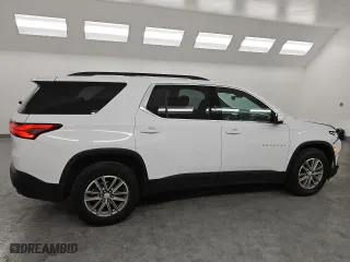 2023 Chevrolet Traverse LT Cloth with VIN 1GNERGKW2PJ135658, listed as a Copart auction lot 50096105 with 77,398 mi miles and Clean Title. Bid and sale history available at carsss.com. Image 3.