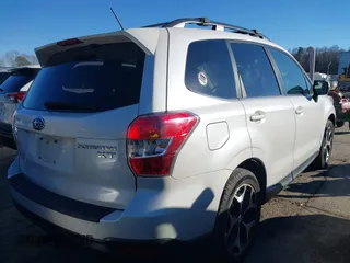 2014 Subaru Forester XT Touring with VIN JF2SJGPC9EH417920, listed as a IAAI auction lot 41270689 with 184,976 mi miles and . Bid and sale history available at DreamBid. Image 4.