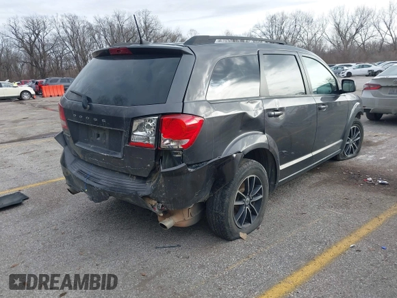 2019 Dodge Journey SE with VIN 3C4PDCBG2KT738516, listed as a IAAI auction lot 41112993 with 201,908 mi miles and . Bid and sale history available at DreamBid. Image 4.