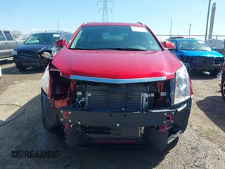 2014 Cadillac SRX Performance Collection with VIN 3GYFNCE34ES519563, listed as a IAAI auction lot 41967051 with 12,603 mi miles and . Bid and sale history available at carsss.com. Image 13.
