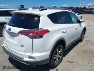 2017 Toyota RAV4 XLE with VIN 2T3RFREV1HW683851, listed as a IAAI auction lot 42051722 with 98,307 mi miles. Bid and sale history available at carsss.com. Image 4.