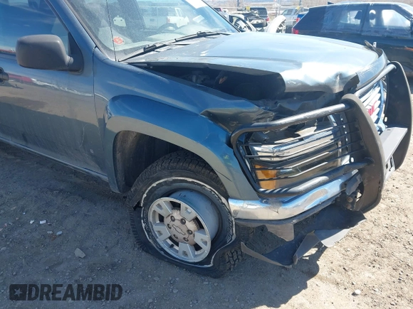 2006 GMC Canyon SLE1 with VIN 1GTDT136768277608, listed as a IAAI auction lot 41884392 with 128,834 mi miles. Bid and sale history available at carsss.com. Image 6.