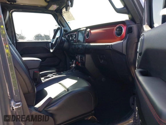 2020 Jeep Gladiator Rubicon with VIN 1C6JJTBG6LL149469, listed as a IAAI auction lot 42224826 with 58,870 mi miles and . Bid and sale history available at DreamBid. Image 5.