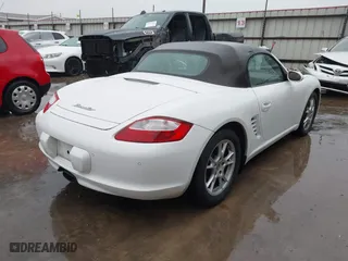 2006 Porsche Boxster with VIN WP0CA29866U710858, listed as a IAAI auction lot 41531596 with 131,849 mi miles. Bid and sale history available at carsss.com. Image 4.