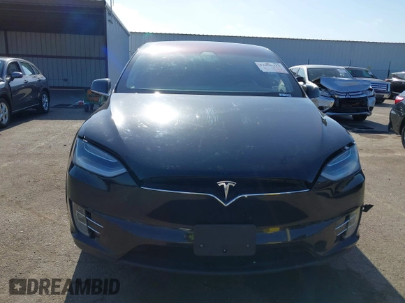 2017 Tesla Model X 90D with VIN 5YJXCBE25HF044617, listed as a IAAI auction lot 42096323 with 115,077 mi miles and . Bid and sale history available at DreamBid. Image 13.