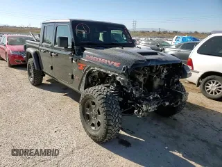 2020 Jeep Gladiator Mojave z VIN 1C6JJTEG1LL209606, wystawiony jako Copart lot #88265265 z przebiegiem 57 098 mil mil oraz Szkoda całkowita • Salvage title. Historia ofert i sprzedaży dostępna na DreamBid. Obrazek 10.