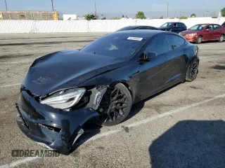 2022 Tesla Model S Plaid with VIN 5YJSA1E64NF464667, listed as a Copart auction lot 46156305 with Not Provided miles and Salvage Title. Bid and sale history available at carsss.com. Image 1.