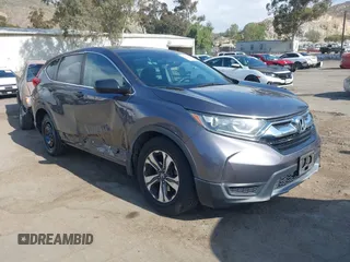 2019 Honda CR-V LX z VIN 2HKRW5H33KH401422, wystawiony jako IAAI lot #42116431 z przebiegiem 119 387 mil mil oraz . Historia ofert i sprzedaży dostępna na DreamBid. Obrazek 1.