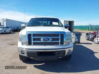 2011 Ford F-150 XLT z VIN 1FTFW1ET2BFC65701, wystawiony jako IAAI lot #42598794 z przebiegiem 209 676 mil mil oraz . Historia ofert i sprzedaży dostępna na DreamBid. Obrazek 12.
