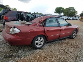 2000 Ford Taurus SES with VIN 1FAFP55U1YA262488, listed as a Copart auction lot 52312645 with 128,621 mi miles and Salvage Title. Bid and sale history available at DreamBid. Image 3.