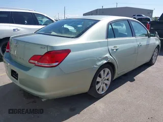 2007 Toyota Avalon XL with VIN 4T1BK36B07U239298, listed as a IAAI auction lot 42046413 with 221,018 mi miles. Bid and sale history available at carsss.com. Image 4.