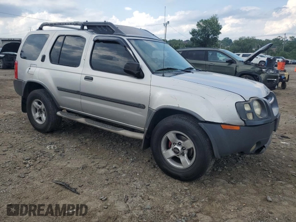 2004 Nissan Xterra XE with VIN 5N1ED28Y54C632928, listed as a Copart auction lot 64201315 with 223,598 mi miles and Salvage title. Bid and sale history available at DreamBid. Image 4.