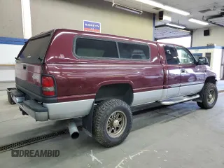 2001 Dodge Ram 2500 with VIN 1B7KF236X1J527039, listed as a Copart auction lot 80070634 with 185,735 mi miles and Salvage Title. Bid and sale history available at carsss.com. Image 3.