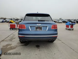 2019 Bentley Bentayga V8 z VIN SJAAM2ZV5KC024865, wystawiony jako Copart lot #42869533 z przebiegiem 23 687 mil mil oraz . Historia ofert i sprzedaży dostępna na DreamBid. Obrazek 6.
