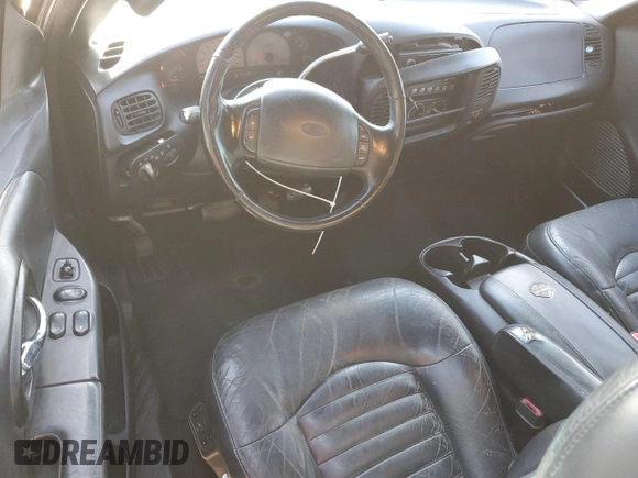 2000 Ford F-150 XL with VIN 2FTRX07L1YCA89598, listed as a Copart auction lot 55571645 with 235,923 mi miles and Salvage title. Bid and sale history available at DreamBid. Image 8.