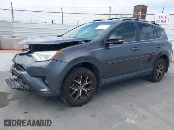2017 Toyota RAV4 SE with VIN JTMJFREV5HJ155712, listed as a IAAI auction lot 42613998 with 72,112 mi miles and . Bid and sale history available at DreamBid. Image 2.