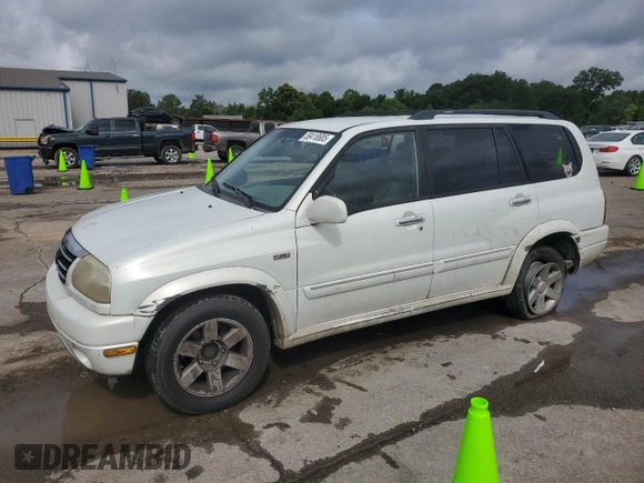 2002 Suzuki XL7 Standard z VIN JS3TY92V024106089, wystawiony jako Copart lot #58418685 z przebiegiem 232 254 mil mil oraz Szkoda całkowita • Salvage title. Historia ofert i sprzedaży dostępna na DreamBid. Obrazek 1.