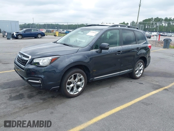 2018 Subaru Forester Touring with VIN JF2SJAWC2JH492788, listed as a IAAI auction lot 42358591 with 83,354 mi miles and . Bid and sale history available at DreamBid. Image 18.