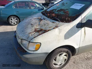 1998 Toyota Sienna LE with VIN 4T3ZF13C1WU052050, listed as a IAAI auction lot 41921780 with 144,769 mi miles. Bid and sale history available at carsss.com. Image 6.
