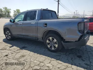 2019 Honda Ridgeline RTL-E with VIN 5FPYK3F73KB016675, listed as a Copart auction lot 55340905 with 69,571 mi miles and Salvage title. Bid and sale history available at DreamBid. Image 2.