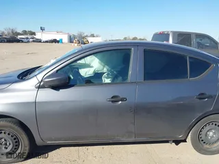 2019 Nissan Versa Sedan SV with VIN 3N1CN7AP8KL812271, listed as a IAAI auction lot 41423740 with 57,233 mi miles. Bid and sale history available at carsss.com. Image 14.