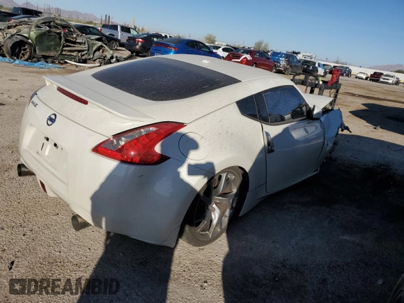 2014 Nissan 370Z Touring with VIN JN1AZ4EH5EM635783, listed as a Copart auction lot 85475214 with 107,712 mi miles and Salvage Title. Bid and sale history available at carsss.com. Image 3.