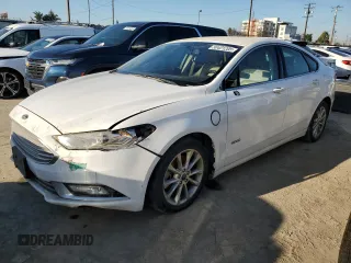2017 Ford Fusion Energi SE with VIN 3FA6P0PU4HR215395, listed as a Copart auction lot 50401205 with 71,256 mi miles and Salvage Title. Bid and sale history available at carsss.com. Image 1.