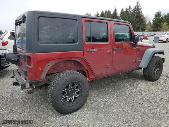 2012 Jeep Wrangler Unlimited Sport with VIN 1C4BJWDG1CL135894, listed as a Copart auction lot 52422245 with 143,670 mi miles and Salvage Title. Bid and sale history available at carsss.com. Image 3.