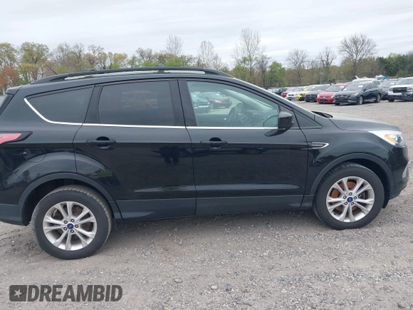2017 Ford Escape SE with VIN 1FMCU9GD0HUC58128, listed as a IAAI auction lot 42078045 with 125,503 mi miles. Bid and sale history available at carsss.com. Image 13.