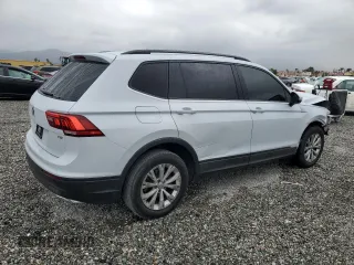 2018 Volkswagen Tiguan S with VIN 3VV1B7AXXJM067370, listed as a Copart auction lot 53645945 with 143,137 mi miles and Salvage title. Bid and sale history available at DreamBid. Image 3.