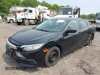 2017 Honda Civic LX z VIN 2HGFC2F50HH539680, wystawiony jako IAAI lot #42434762 z przebiegiem 112 572 mil mil oraz . Historia ofert i sprzedaży dostępna na DreamBid. Obrazek 2.