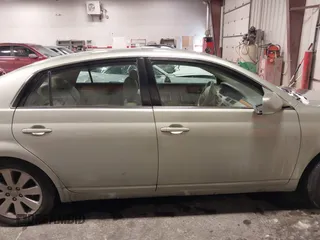 2006 Toyota Avalon XL with VIN 4T1BK36B16U062713, listed as a IAAI auction lot 41598608 with 142,598 mi miles. Bid and sale history available at carsss.com. Image 13.