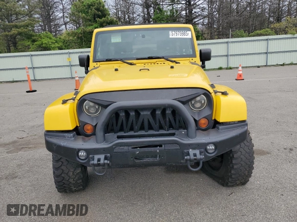 2009 Jeep Wrangler Unlimited Rubicon with VIN 1J8GA69109L761089, listed as a Copart auction lot 57975985 with 195,530 mi miles and Salvage title. Bid and sale history available at DreamBid. Image 5.