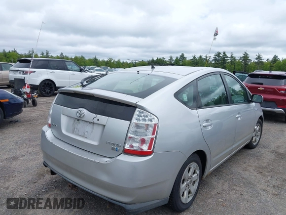 2006 Toyota Prius z VIN JTDKB20U967074471, wystawiony jako IAAI lot #42332013 z przebiegiem 303 162 mil mil oraz . Historia ofert i sprzedaży dostępna na DreamBid. Obrazek 4.