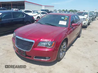 2014 Chrysler 300 with VIN 2C3CCABT2EH157487, listed as a IAAI auction lot 40127984 with 82,957 mi miles. Bid and sale history available at carsss.com. Image 2.