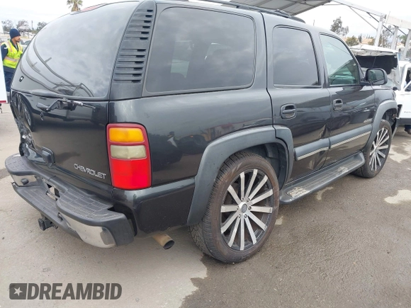 2003 Chevrolet Tahoe LS with VIN 1GNEC13T73R297770, listed as a IAAI auction lot 42071895 with 215,848 mi miles. Bid and sale history available at carsss.com. Image 4.