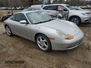 1999 Porsche 911 z VIN WP0AA2992XS621138, wystawiony jako Copart lot #49492405 z przebiegiem 148 064 mil mil oraz Czysty tytuł • Clean title. Historia ofert i sprzedaży dostępna na DreamBid. Obrazek 4.