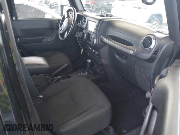 2016 Jeep Wrangler Unlimited Sport with VIN 1C4BJWDG7GL155900, listed as a IAAI auction lot 42380356 with 78,582 mi miles and . Bid and sale history available at DreamBid. Image 5.