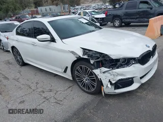 2018 BMW 5 Series 530i z VIN WBAJA5C54JG898565, wystawiony jako IAAI lot #41745230 z przebiegiem 123 776 mil mil oraz . Historia ofert i sprzedaży dostępna na DreamBid. Obrazek 1.