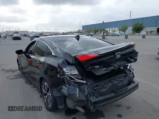 2016 Honda Civic Sedan EX-L with VIN 19XFC1F72GE217515, listed as a IAAI auction lot 41893795 with 130,703 mi miles. Bid and sale history available at carsss.com. Image 6.