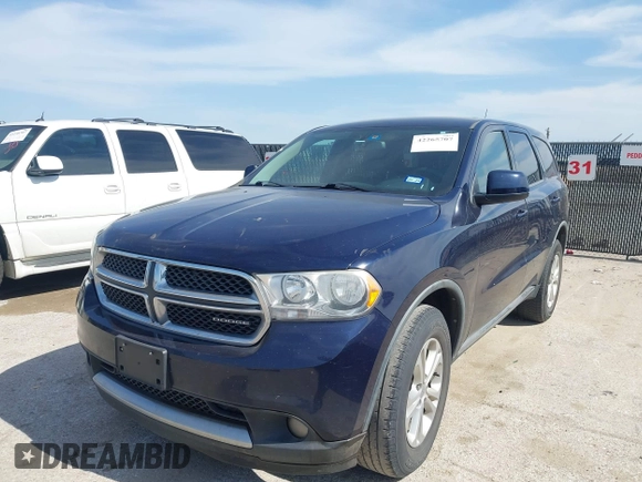 2012 Dodge Durango SXT with VIN 1C4RDHAG7CC197452, listed as a IAAI auction lot 42265707 with 217,252 mi miles and . Bid and sale history available at DreamBid. Image 2.