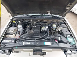 1998 GMC Sonoma with VIN 1GTCS1445WK505426, listed as a IAAI auction lot 41710516 with 112,703 mi miles. Bid and sale history available at carsss.com. Image 10.