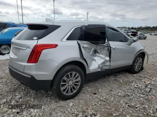 2017 Cadillac XT5 Luxury FWD with VIN 1GYKNBRS7HZ263985, listed as a Copart auction lot 50231215 with 28,542 mi miles and Salvage Title. Bid and sale history available at DreamBid. Image 3.
