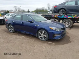 2019 Kia Optima LX with VIN 5XXGT4L38KG304763, listed as a IAAI auction lot 41977858 with 143,569 mi miles. Bid and sale history available at carsss.com. Image 1.