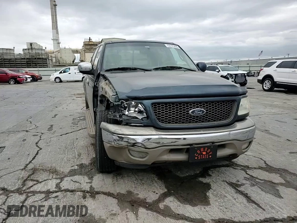 2001 Ford F-150 XLT with VIN 1FTRW07LX1KA18940, listed as a Copart auction lot 50723495 with 133,686 mi miles and Salvage title. Bid and sale history available at DreamBid. Image 11.
