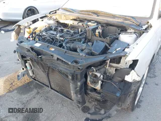 2005 Mazda 3 s with VIN JM1BK323X51247345, listed as a IAAI auction lot 41761337 with 156,060 mi miles. Bid and sale history available at carsss.com. Image 6.