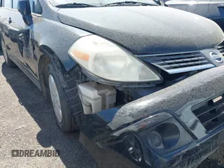 2009 Nissan Versa S with VIN 3N1BC11E19L440957, listed as a IAAI auction lot 40039437 with Not Provided miles and . Bid and sale history available at DreamBid. Image 12.