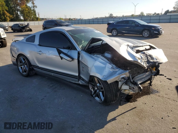 2010 Ford Mustang GT500 with VIN 1ZVBP8JS3A5156425, listed as a Copart auction lot 77348134 with 61,984 mi miles and Salvage title. Bid and sale history available at DreamBid. Image 4.